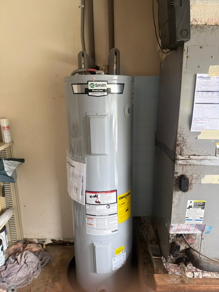 Rusted water heater found during a PureFlo Plumbing leak inspection