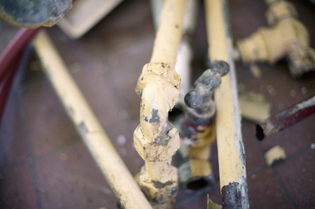 Corroded pipe and valve with mineral build-up