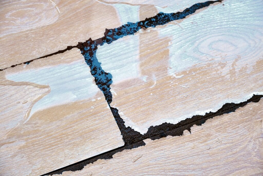 Cracked tile floor caused by a slab leak