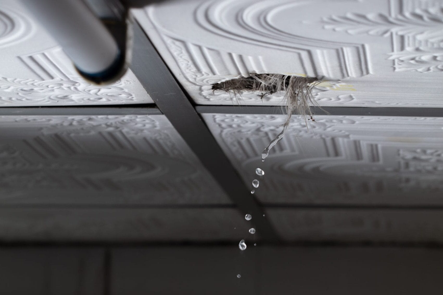 Water leaking from a pipe joint